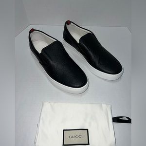 GUCCI Men’s monogram leather embossed slip on sneakers
